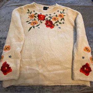 Cliche beige embroidered flower sweater.